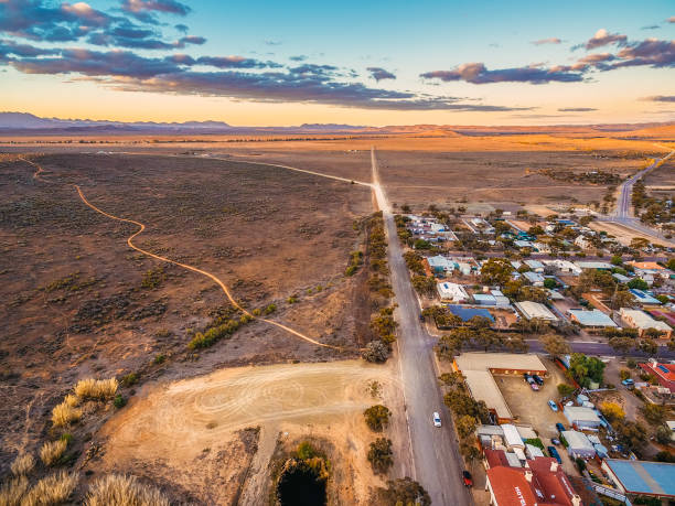Aerial view of a regional town on the edge of the outback at dusk